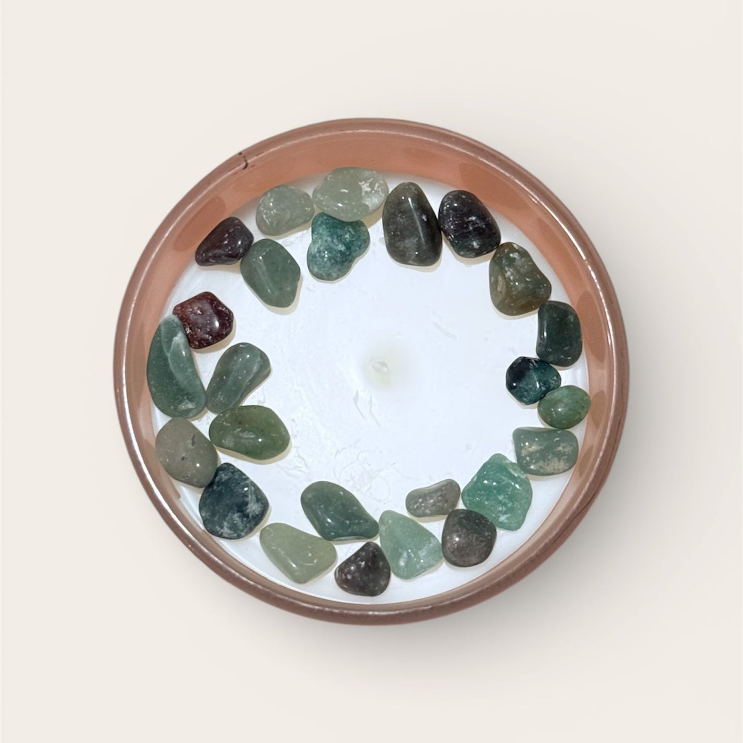 Candle with multicolored aventurine crystals